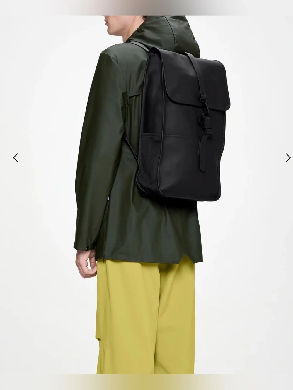 Rains  Backpack is clean and ever-contemporary. Like new no tag